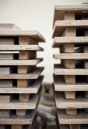 Beautiful matte tiles in wooden drying racks in a factory warehouse setting. Nostalgic timeless tile...