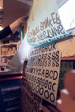 retro letters and typography graphics. typographers hand painted signs and symbols. Studio art painting signage and letters. Alphabet words.の写真素材