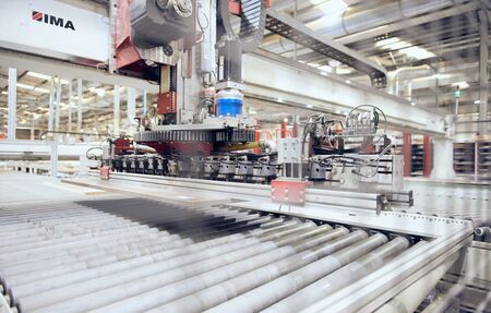 london, england, 05/05/2019 Industrial automated robot machinery in an industrial workshop factory...