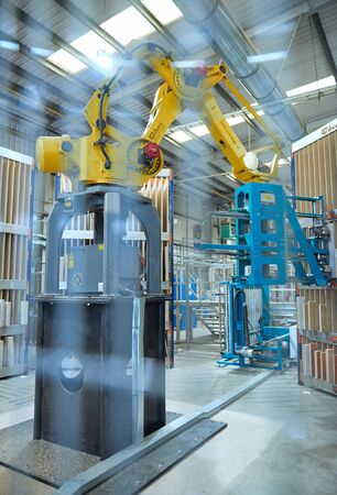 london, england, 05/05/2019 Industrial automated robot machinery in an industrial workshop factory...