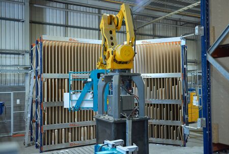 london, england, 05/05/2019 Industrial automated robot machinery in an industrial workshop factory...