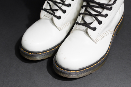 london, england, 05/05/2019 Dr Martens 1460 white Leather Boots 8 Eye lace hole. fashionable punk historic british made leather boots. dr martens air war with bonding soles. built to last.のeditorial素材