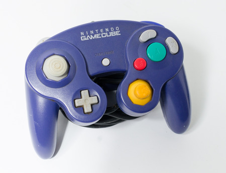 london, england 05/052019 A Purple Nintendo Game Cube Console on a white isolated background. iconic...