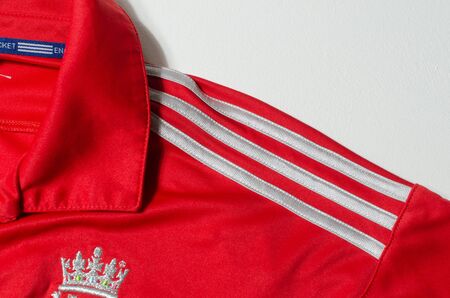 london, england, 05/05/2019 An England Cricket Brit Insurance adidas red international Shirt 2013....