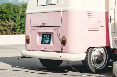 london, england, 05/05/2019 A beautiful well looked after pink VW volkswagen camper van parked up in a car park. collectors vintage vehicle for camping and surfing holidays. summertime fun.のeditorial素材
