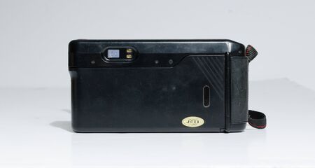 london, england, 05/05/2018 A Retro vintage Halina vision xms 35mm film camera isolated on a white...