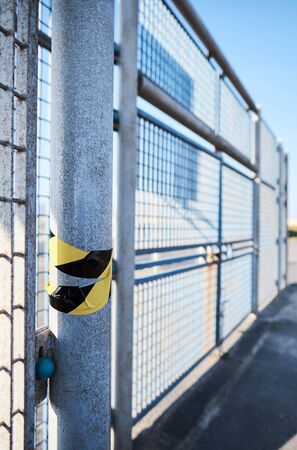 Covid 19, coronavirus closure signs on public play parks and exercise courts to help stop the spread of the corona virus disease. England is on lockdown to flatten the pandemic curve.の写真素材