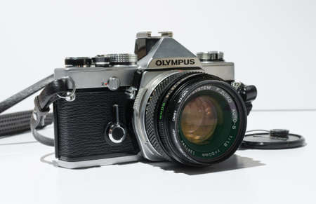 london, england, 05/05/2018 A Retro vintage olympus om 1N 35mm single lens reflex film camera,and...