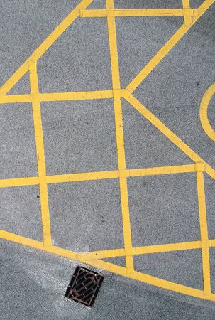 parking bay and disable parking bays from above photographed in an urban setting with a drone. lines and pattern street road markings. straight lines and geometric. drone photography aboveの写真素材