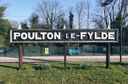 poulton le fylde, england, 05/05/2019 Poulton le fylde railway station sign at the train station in...
