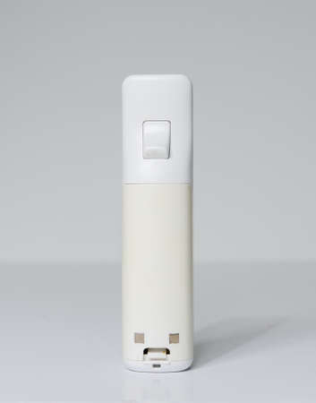london, england 05/052019 A white Nintendo wii Controller on a white isolated background. iconic...
