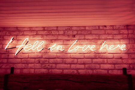 london, england, 05/05/2018 An inspirational romantic white neon sign saying , i fell in love here,...