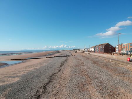 An empty beach on a hot summers day empty due to the coronavirus lockdown during the corona virus covid 19 epidemic pandemic. Empty roads and beaches enforced by the government.の写真素材