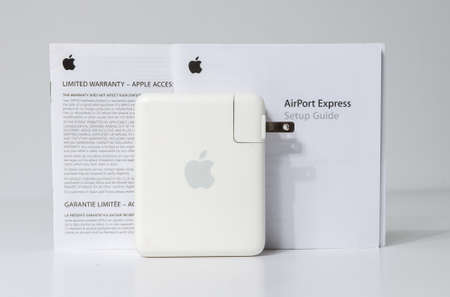 london, england, 05/04/2020 A vintage retro apple airport express wifi 802.11n and bluetooth range...