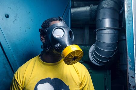 A black male with a military grade gas mask to protect himself from the corona virus covid19...