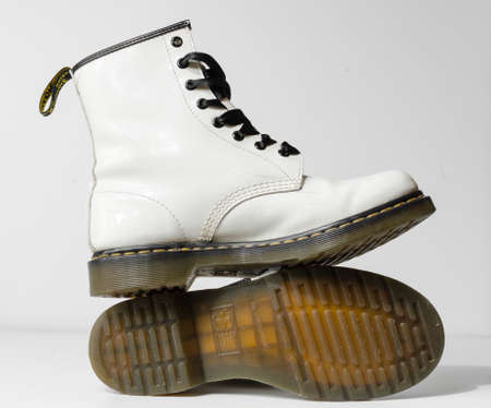london, england, 05/05/2019 Dr Martens 1460 white Leather Boots 8 Eye lace hole. fashionable punk historic british made leather boots. dr martens air war with bonding soles. built to last.のeditorial素材