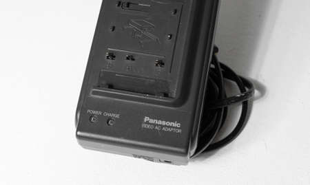 london, england, 26/05/2020 A retro vintage handy cam video camcorder battery charger for an old hi...