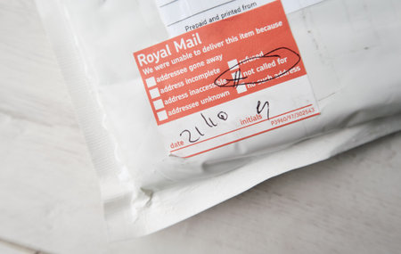 london, uk, 05/05/20202 A royal mail underpaid item fee return request on a second class posted large letter. Pre paid post returns lost in the post. Return to sender white envelope.のeditorial素材