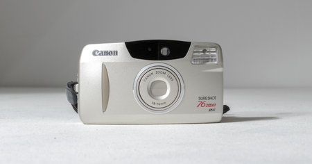 london, england, 05/05/2019  a retro vintage 1990s canon sure shot 76 zoom AF 35 mm film camera...