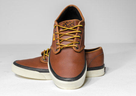 london, uk, 18/05/2019 Vans skateboarding Vans Era Lux brown Leather Mens Trainers style shoes white...