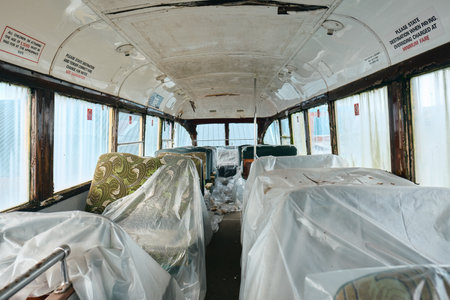 Blackpool, uk 01.01.2023 interior and retro seats of an Old forgotten rusty Blackpool tram. Famous iconic seaside tourist attraction transport carriages. Rusting historic iconic trams interiorのeditorial素材