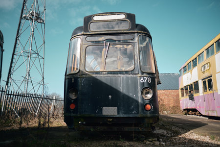 Blackpool, uk 01.01.2023 Old forgotten rusty Blackpool trams. Famous iconic seaside tourist attraction transport carriages. Rusting historic iconic trams rusting and rotting in a scrapyard.のeditorial素材