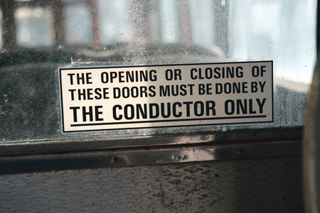 Danger Signage on Old forgotten rusty Blackpool trams. Famous iconic seaside tourist attraction transport carriages. Rusting historic iconic trams rusting and rotting in a scrapyard.の写真素材