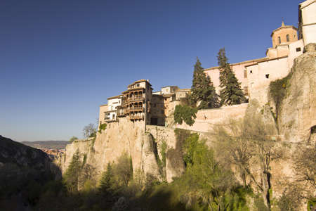Hanging Houses of Cuenca are built on a rocky outcrop at the Hoz de Huecar, a gorge formed at the join of the Jucar and Huecar rivers in La Mancha province of Spainのeditorial素材