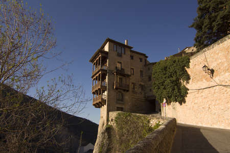 Hanging Houses of Cuenca are built on a rocky outcrop at the Hoz de Huecar, a gorge formed at the join of the Jucar and Huecar rivers in La Mancha province of Spainのeditorial素材