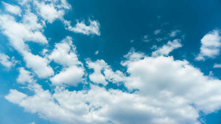 blue sky on sunny day with white cloudsの写真素材