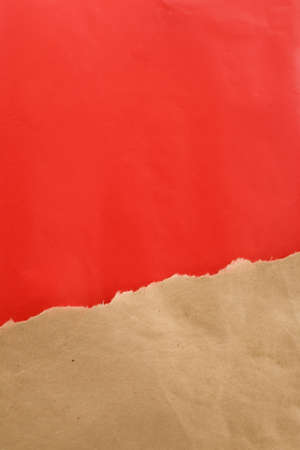 This Christmas concept depicts a mailed package being torn off to reveal a Christmas gift underneath.の写真素材