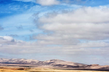 Scenic Mountain and dramatic clouds in a landscape imageの写真素材