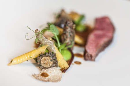 Beef with morel, asparagus and pasta の写真素材