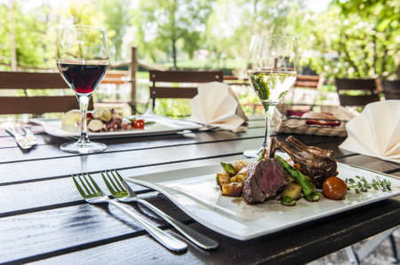 Dining table in the gardenの写真素材