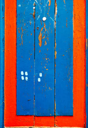 Blue and red wooden board lumber の写真素材