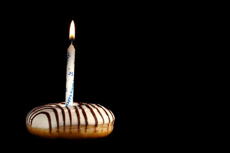 One candle in the doughnut - my first birthday 