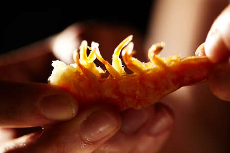 Shrimp in hands  Macro shot with beautiful backlight  Horizontal shot の写真素材