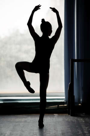 Ballerina silhouette dancing in black and whiteの写真素材