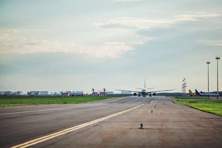 Airplane taxing on the runway is ready for takeoffの写真素材