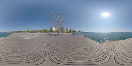 THESSALONIKI, GREECE - AUGUST 26, 2017: 360 photo - Blue sea and waterfront view. Tourists exploring...
