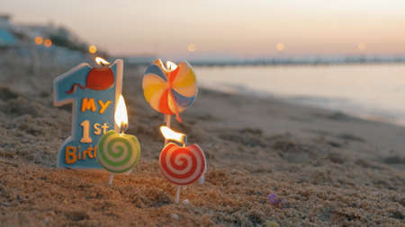 Burning candles for the baby boy first birthdayの写真素材