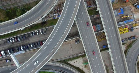 Aerial shot of multilevel road intersection over rail tracks, Moscowのeditorial素材