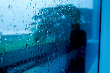 Raindrops that wet the window