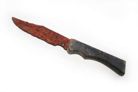 Isolated image of a heavily rusted, fixed blade knife with a black handle.の写真素材