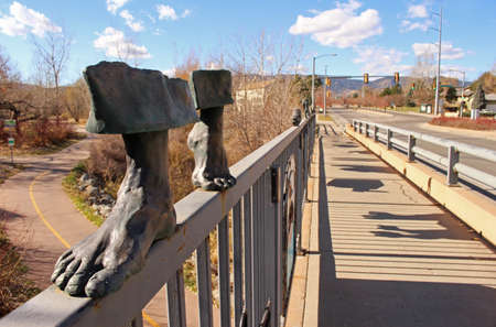 FORT COLLINS, COLORADO, NOV 14, 2016 - Public art sculpture on bridge railing over bicycle path.のeditorial素材
