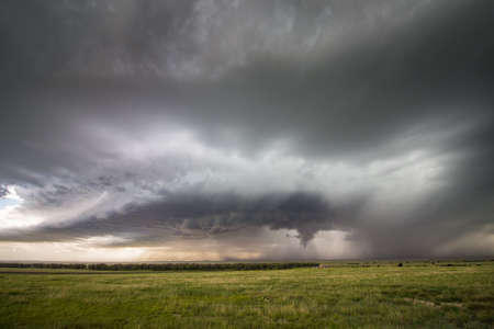 A supercell thunderstorm approaches on the plains of eastern Colorado during the afternoon.の写真素材