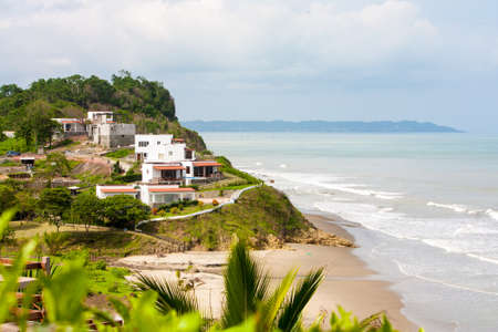 A high view looking down at the beautiful vista of turqoise water and sany beach near Jama Ecuadorの写真素材