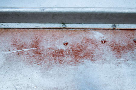 Old weathered aluminum boat makes great backdrop for cottage and fishing related subjectsの写真素材