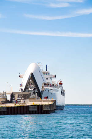 At the dock in Tobermory, the Chi-Cheemaun ferry transports passengers and vehicles between Tobermory and Manitoulin Island in the Northern Bruce Peninsula.のeditorial素材