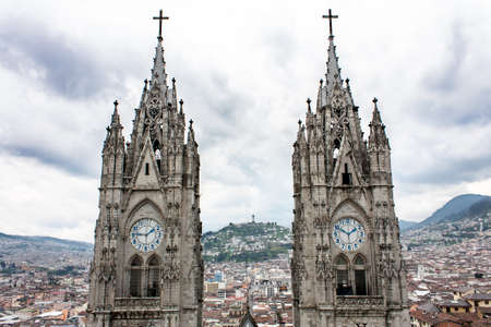 The twin clock towers of Basílica del Voto Nacional in Quito Ecuadorの写真素材